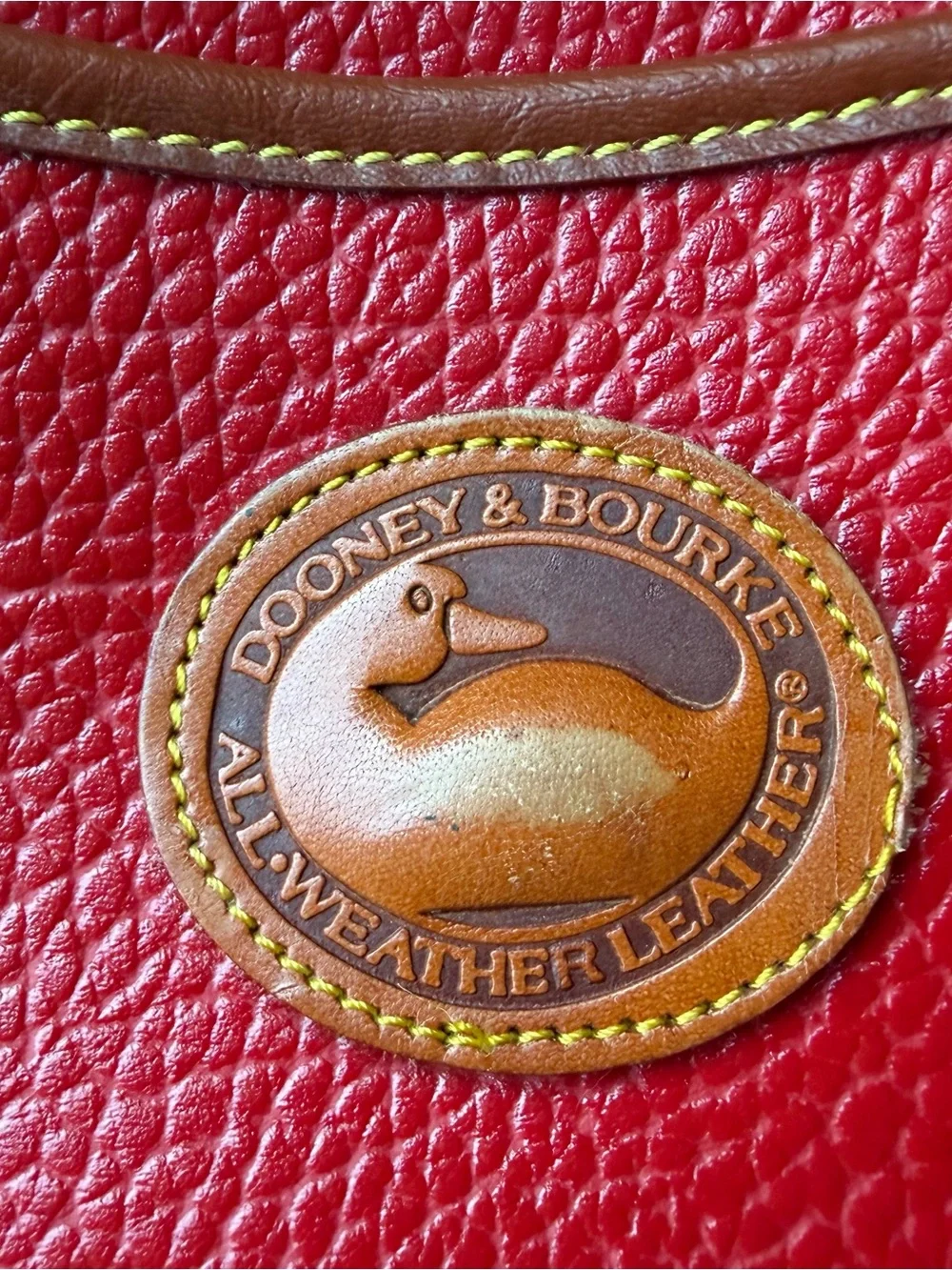 Dooney & Bourke Red Pebbled Leather Shoulder Bag with Brown Trim